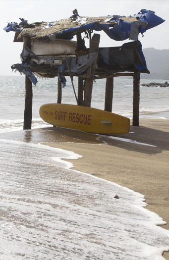 Beach in Goa with surf rescue surfboard